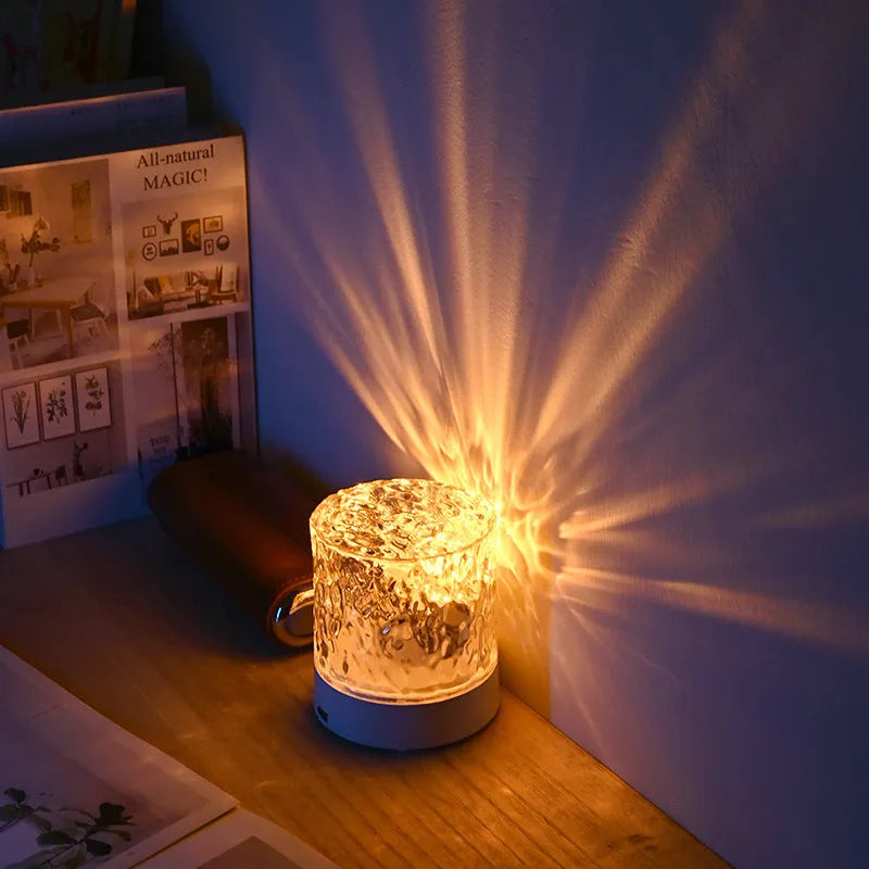 Crystal water ripple projector night light with acrylic lampshade, USB charging and touch control on a table