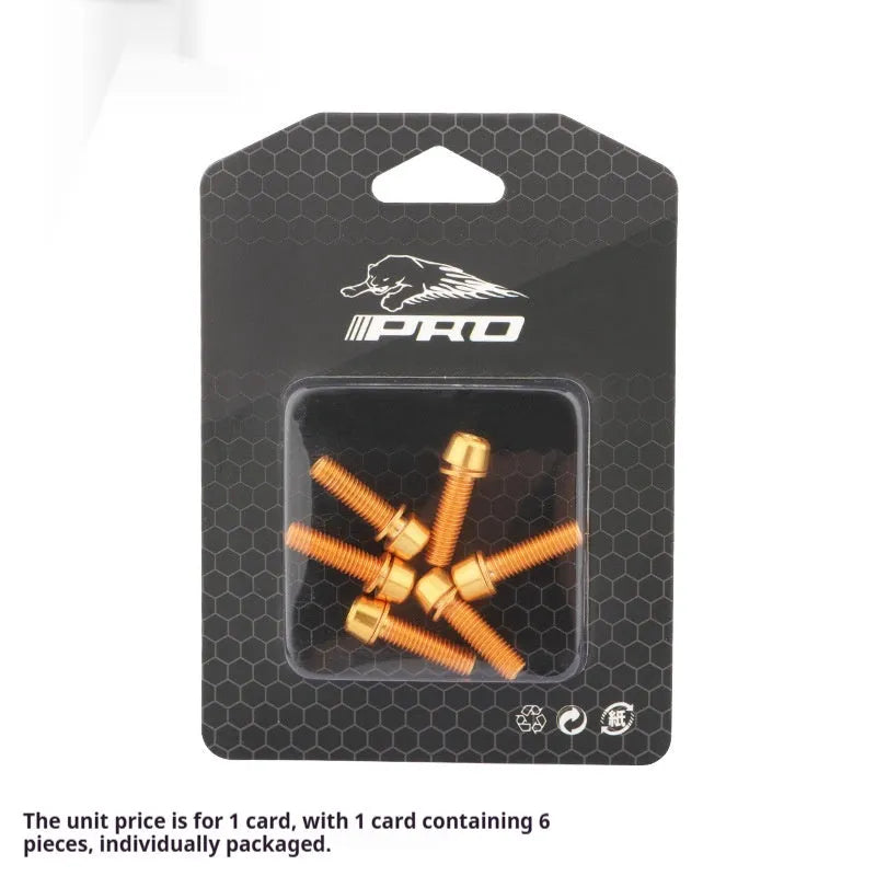Set of six coloured stainless steel screws for mountain bike handlebar riser clamps on a card.