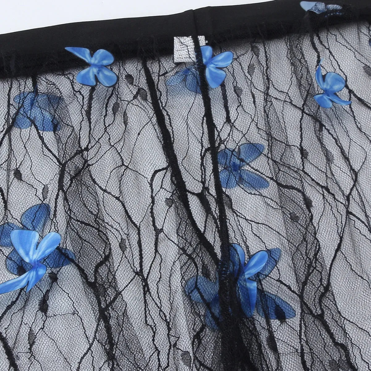 Women's black transparent butterfly pattern bikini three-piece set, showing top, underwear, and pants.