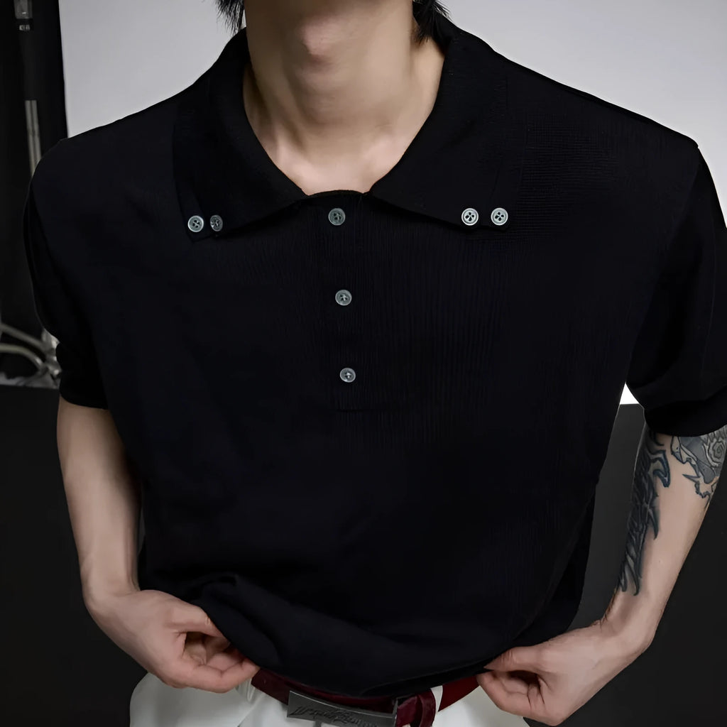 Man wearing a grey slim knit short sleeve shirt with a double lapel collar design.