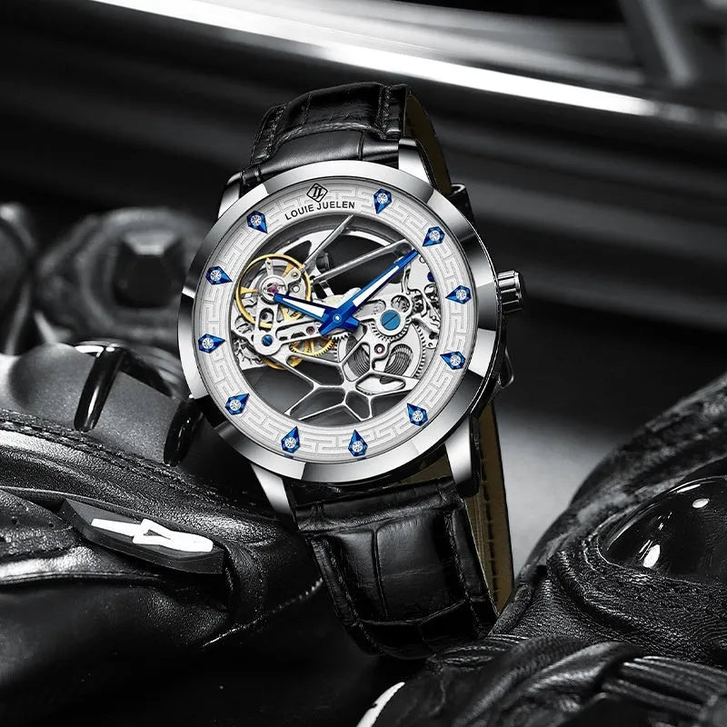 Men's silver mechanical watch with white dial, blue hands and black leather strap