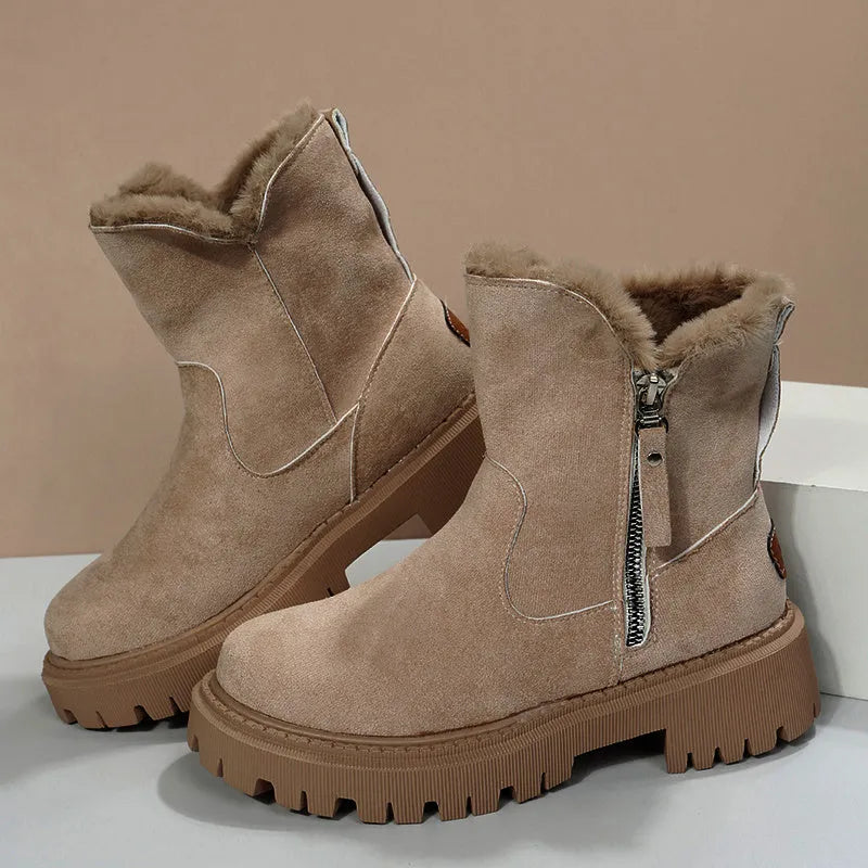 Women's black high-top snow boot with side zip, faux fur lining visible, and a rubber sole.