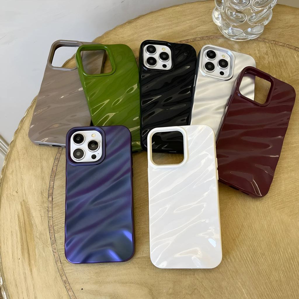 Wave patterned soft TPU phone case for Apple iPhone in burgundy colour showing anti-fall design.