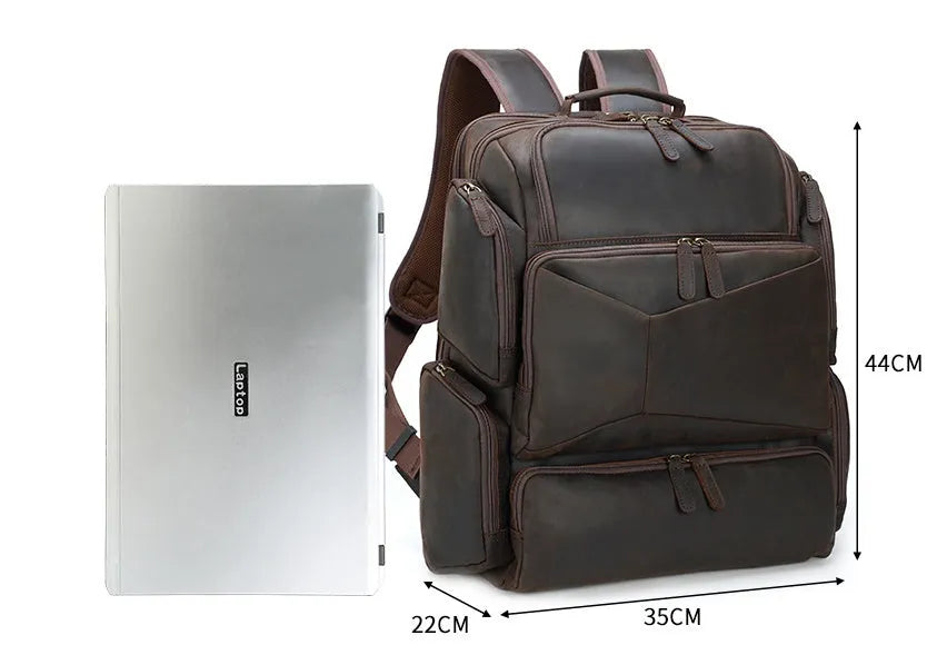 Dark brown retro leather backpack for men with a 17-inch laptop compartment open.