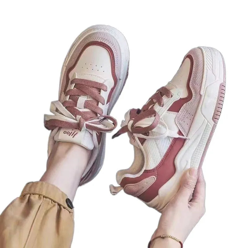 Women's pink spring sneakers with low top design and rubber sole