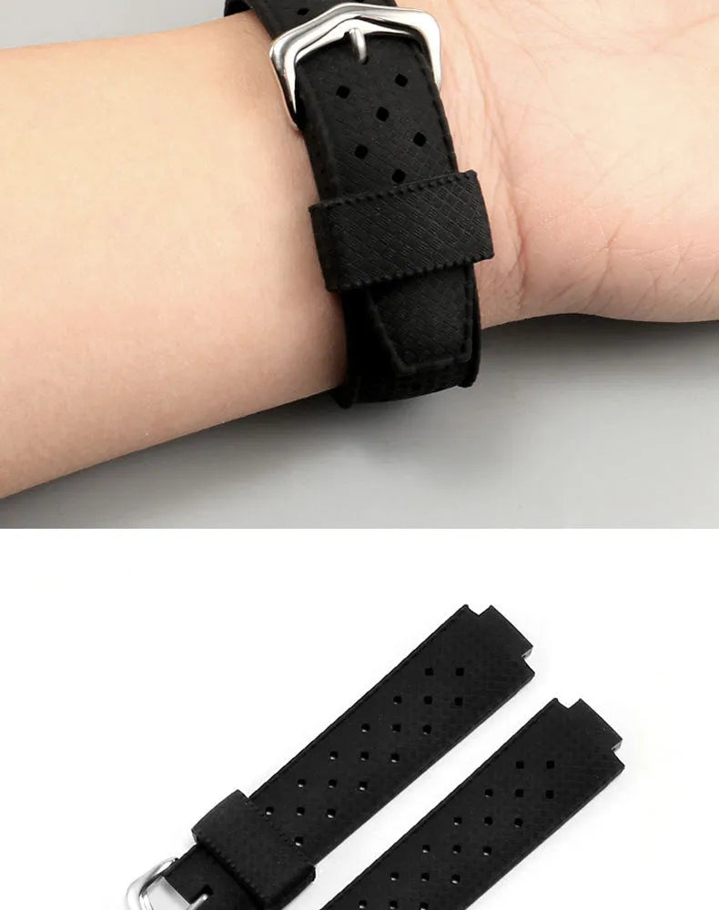 Black silicone watch strap with raised mouth and silver pin buckle on a smart watch
