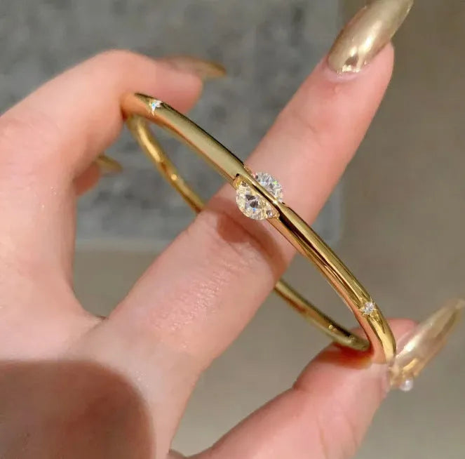 Universe Star Rotation high sense niche bracelet, copper alloy electroplated gold finish with planet design