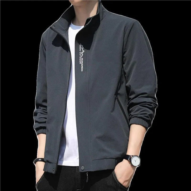Men's black stand collar casual sports coat with straight hem and long sleeves on a hanger.