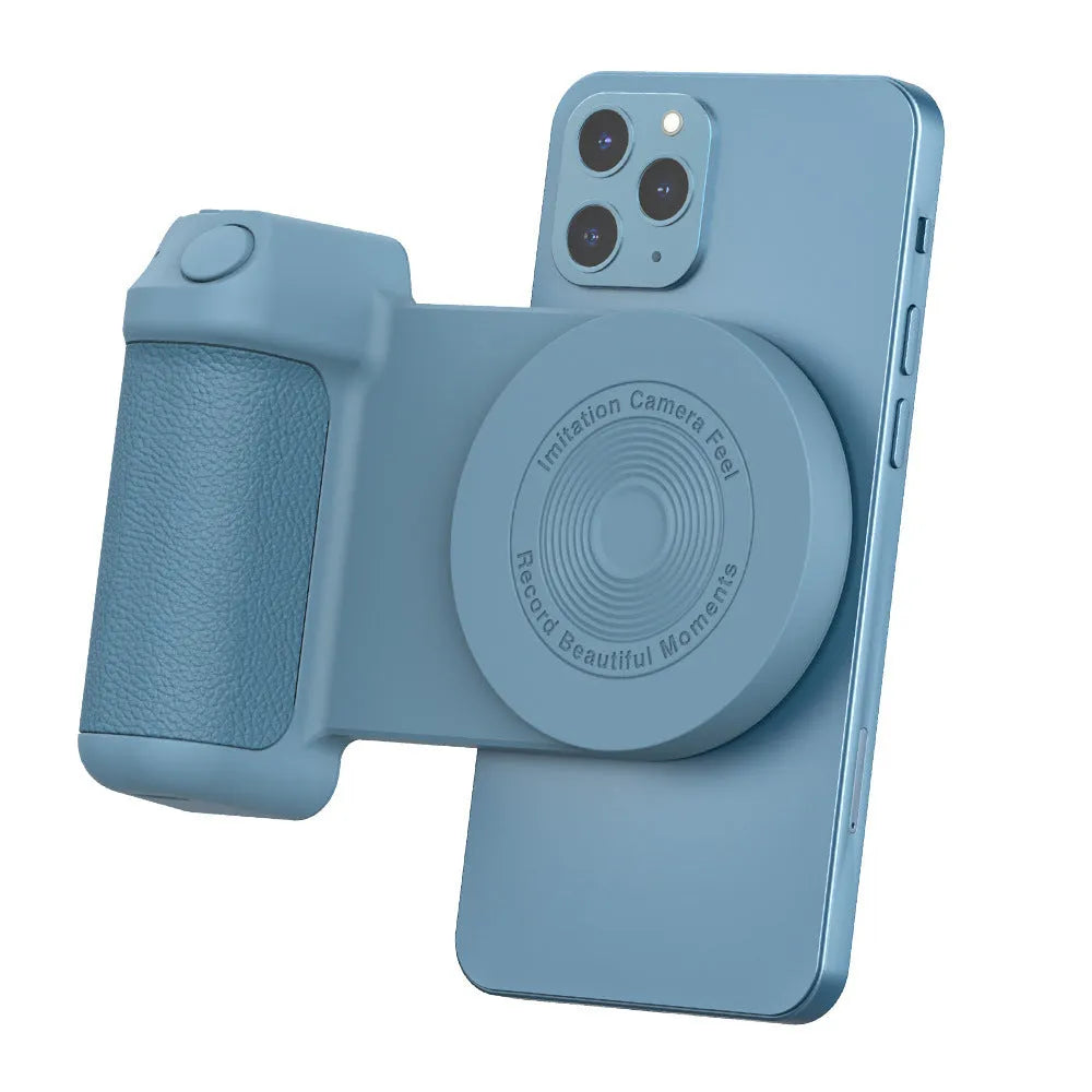 Black magnetic phone camera holder with rotatable grip on wooden table demonstrating phone attachment