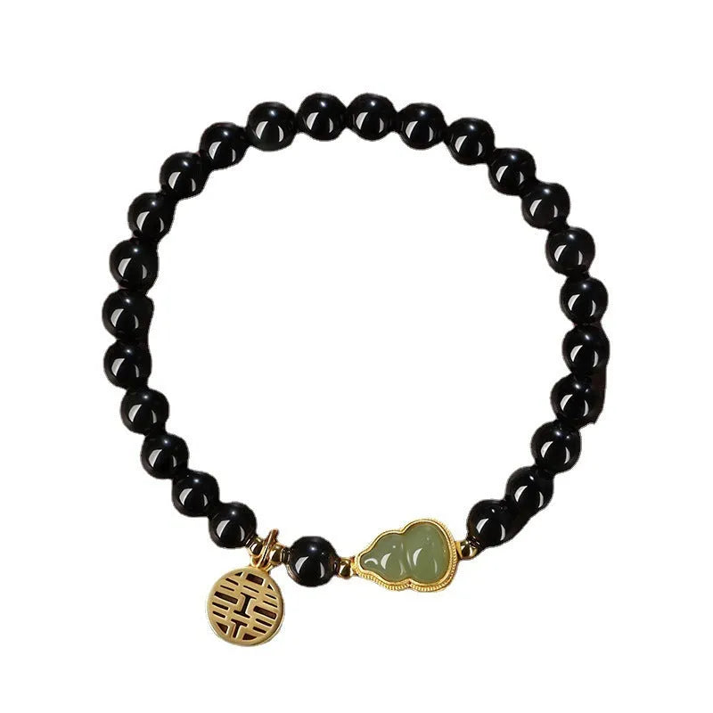Black obsidian bracelet with Hetian jade gourd charm in geometric pattern