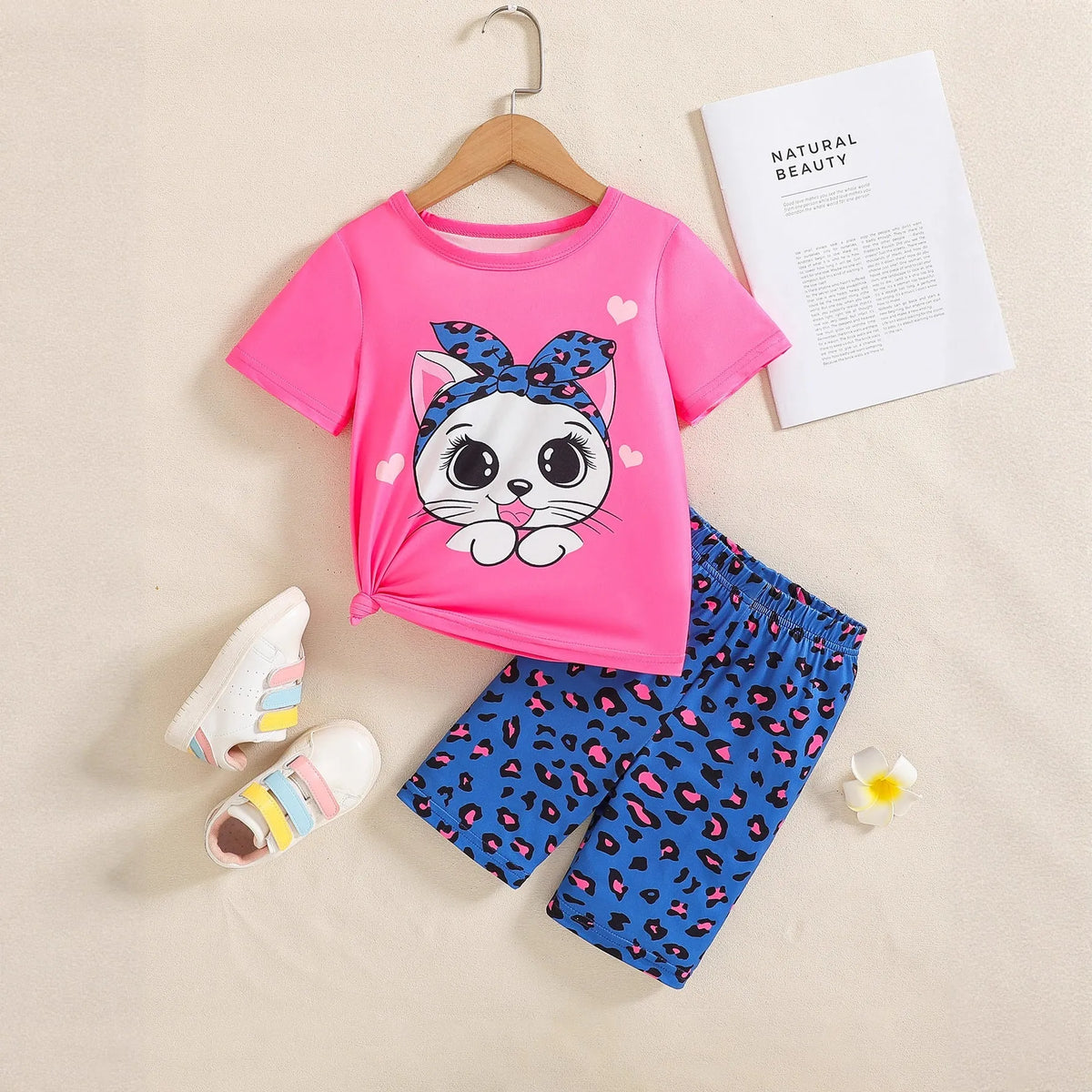Girls dark pink cotton two-piece summer set with kitty patch, short sleeve top and shorts, sizes 4Y-7Y.