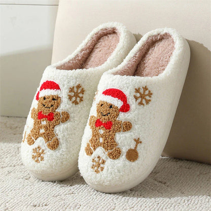 Cozy and stylish gingerbread and snowflake slippers with a plush, fuzzy exterior and non-slip sole for indoor wear