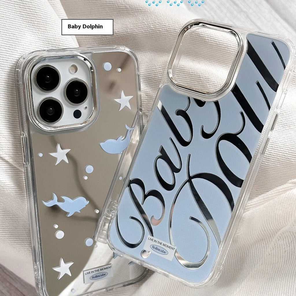 Transparent blue iPhone case with mirror surface and white JMKJ letters showing front and back views