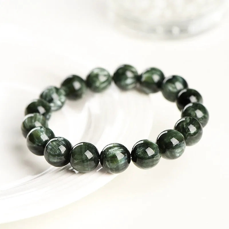 Natural green dragon crystal bracelet with round beads and traditional ruyi design elements