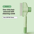 Green self-cleaning pet comb with release button and stainless steel teeth for dog and cat grooming