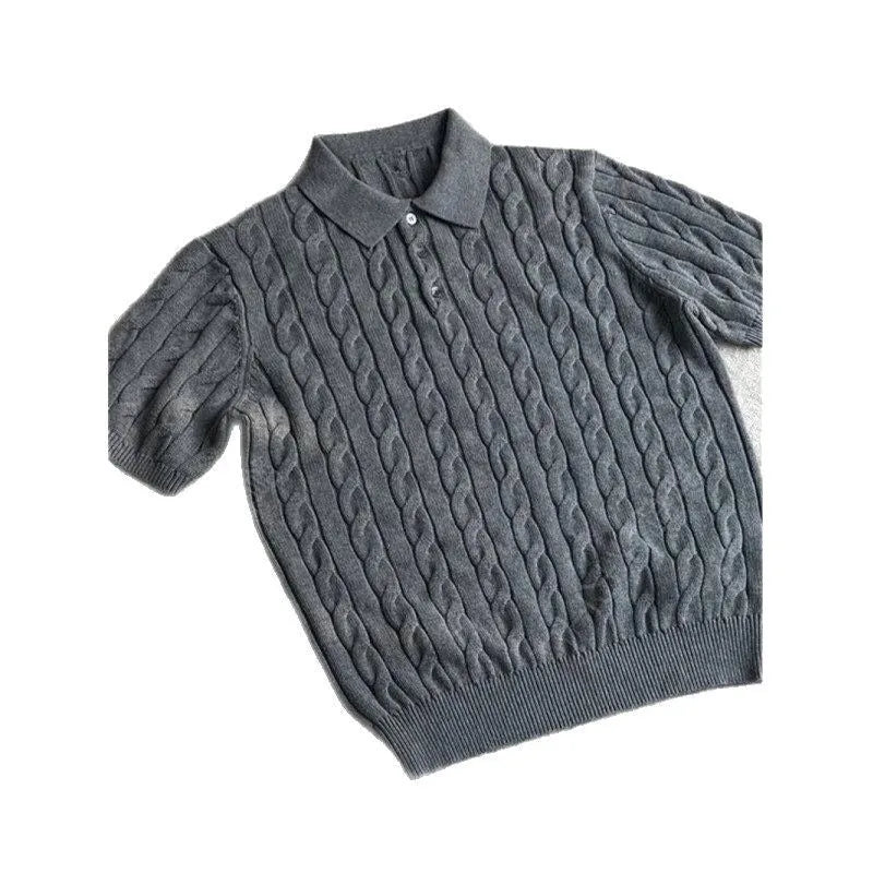 Man wearing a gray knitted short sleeve crew neck t-shirt, casual summer outfit.