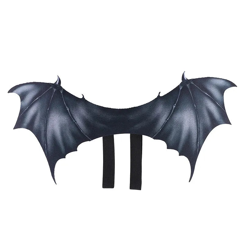Black cloth bat wing costume for pets on a dog, showing three size options for Halloween.