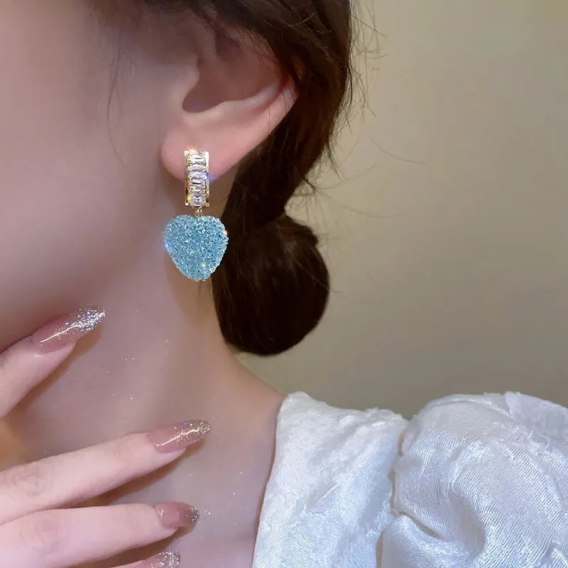 Candy stud earrings with heart-shaped peach design in pink and blue alloy jewellery options