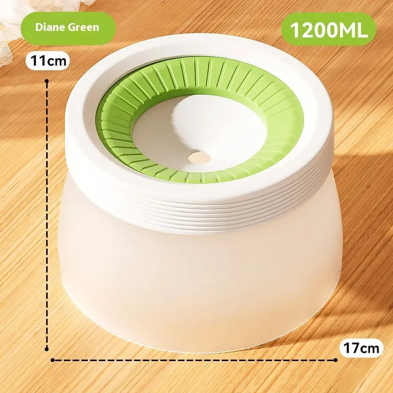 Suspended green pet water bowl for dogs and cats on a white plate base.