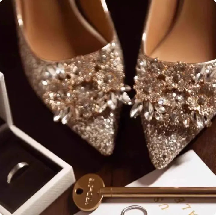 Champagne coloured bridal shoes with rhinestone crystal flower patterns and pointed toe design