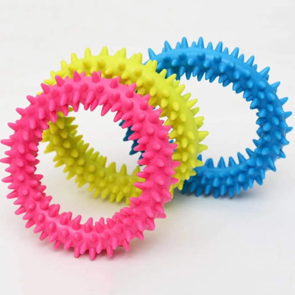Blue spiky circle ring dog chew toy made from TPR for dental cleaning and bite training.