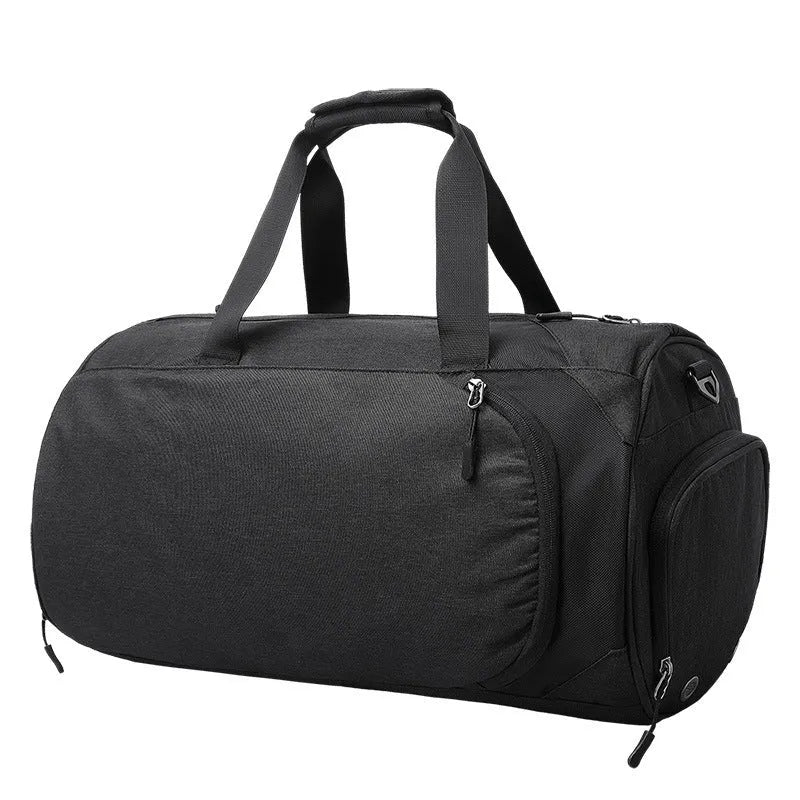 Medium oval travel bag in Oxford cloth with internal zippered compartments for wet-dry separation.