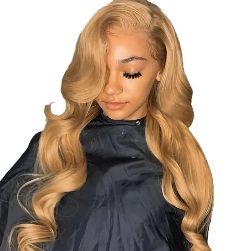 Synthetic wig with big golden wave curls and side bangs in light brown colour