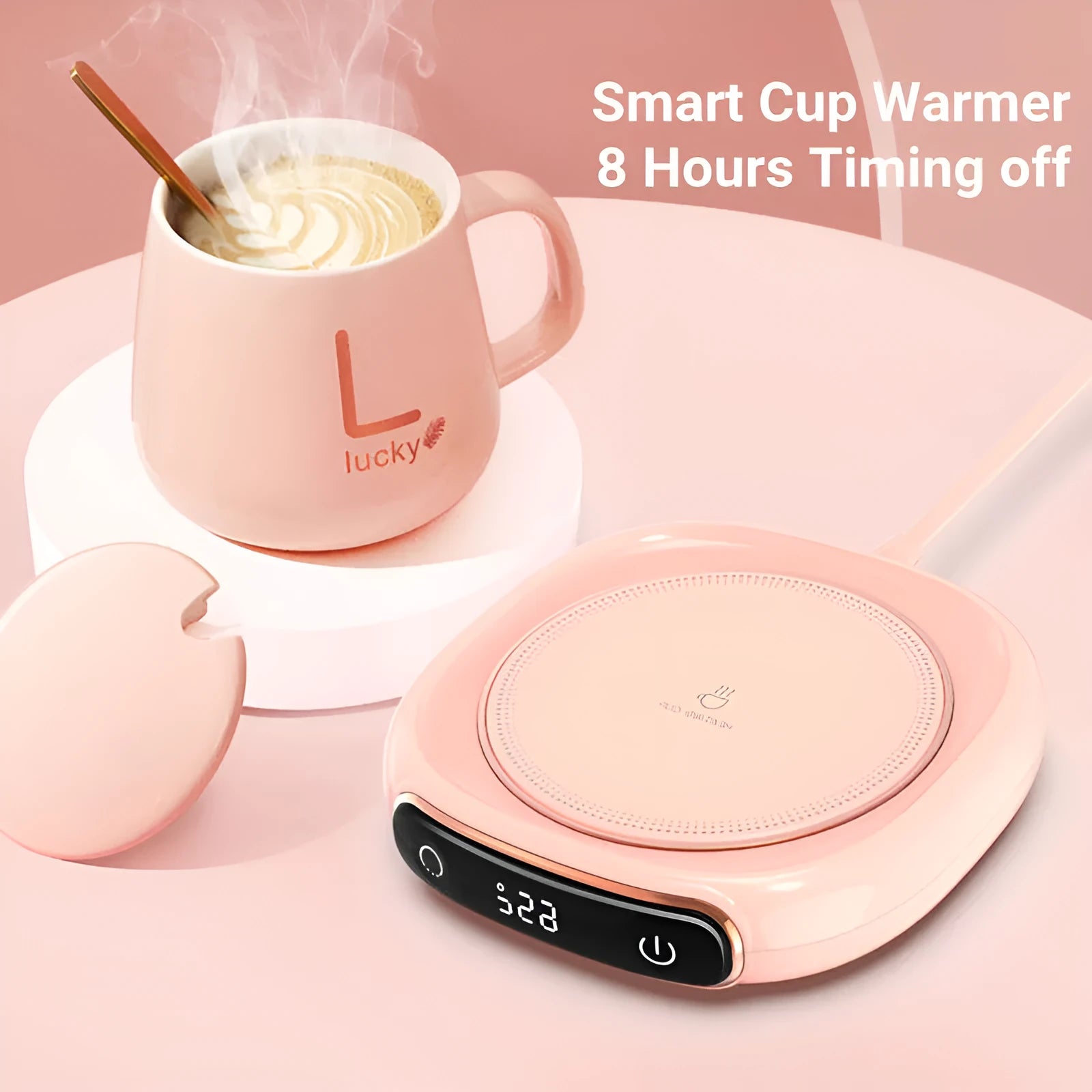 White USB-powered coffee mug warmer on desk heating a ceramic coffee cup
