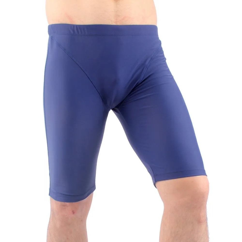 Men's green and navy blue swimming trunks with quick-dry fabric and anti-embarrassment lining