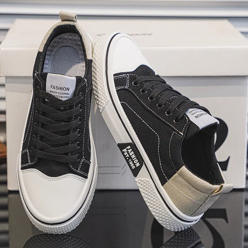 Men's low-top casual canvas shoes in blue colour with round toe and front lace-up design