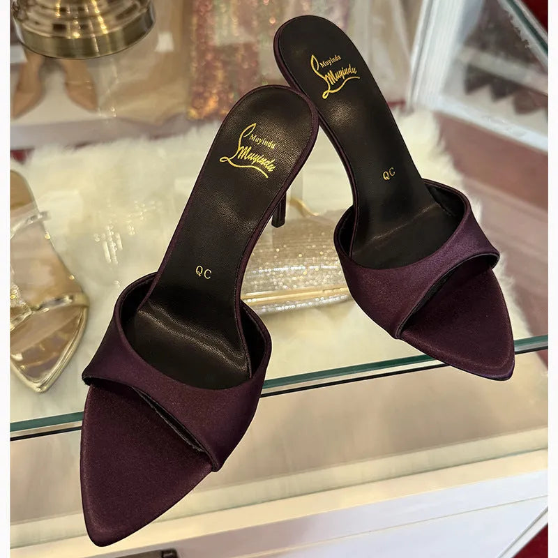 Women's black patent leather stiletto sandals with 8cm heel, pointed toe, and ankle strap