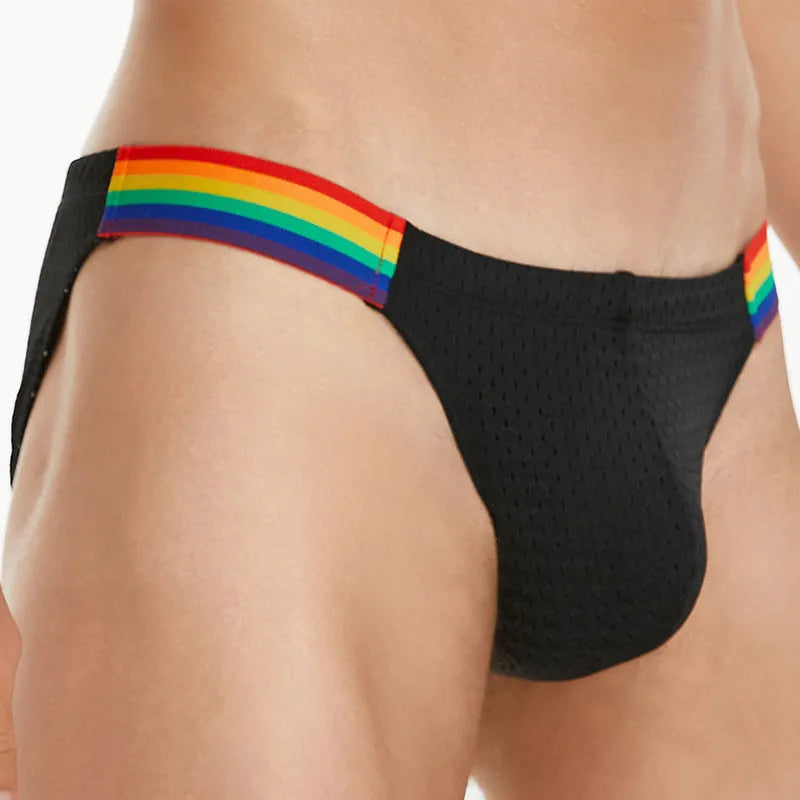 Men's black nylon mesh briefs with a low waist and multicolour rainbow waistband.
