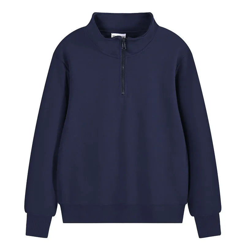 Man wearing a grey zip-front stand collar cotton sports sweater with a straight cut for casual wear.