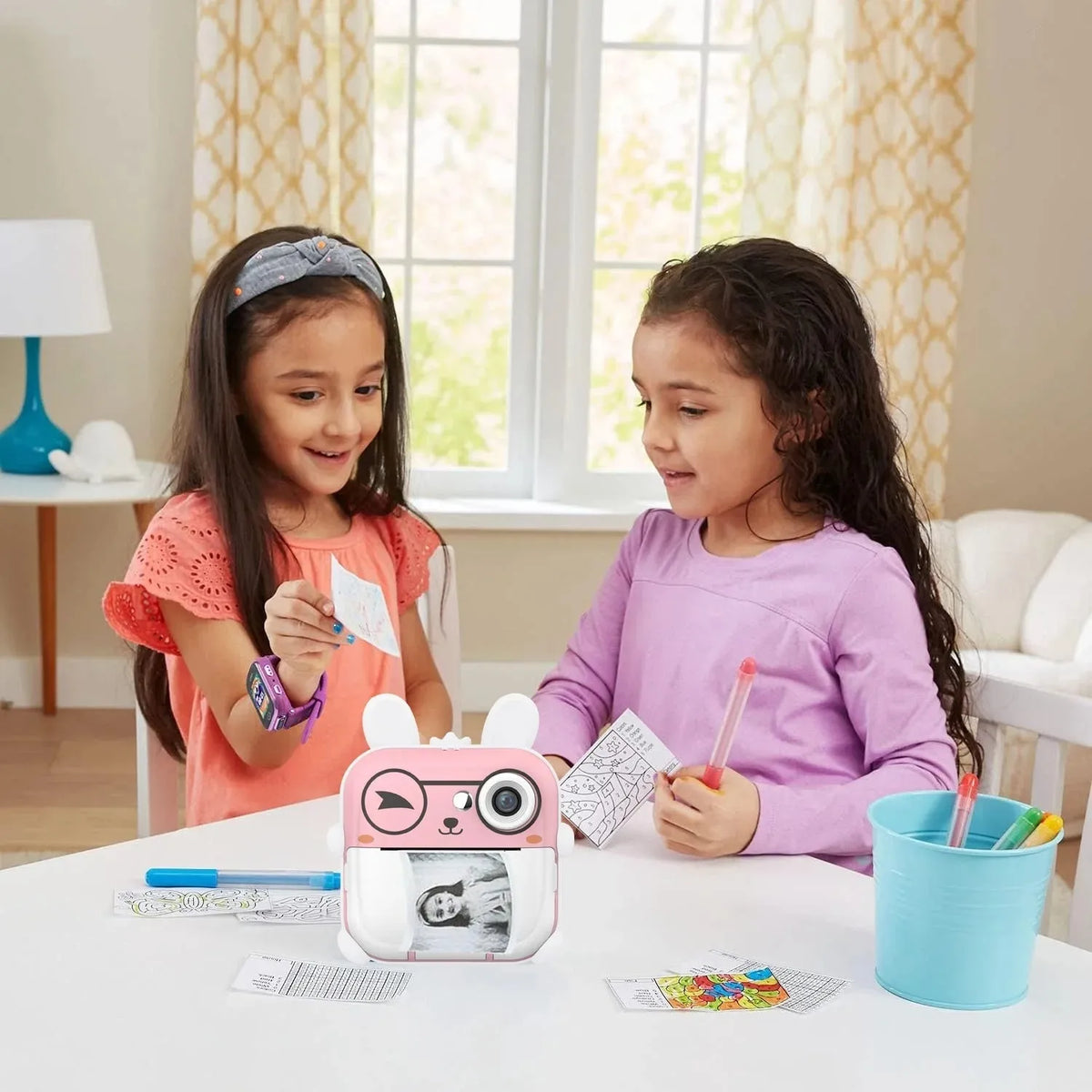 Q5 Polaroid children's digital cartoon camera in pink rabbit design with lanyard on a white background