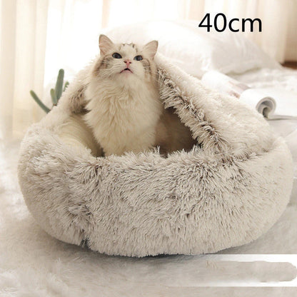 A soft, plush pet bed in various colors, including olive green, brown, pink, and grey, designed for the comfort and relaxation of cats and dogs.