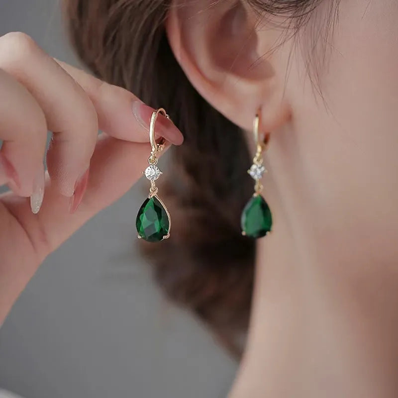 Geometric teardrop earrings in vivid green with alloy construction