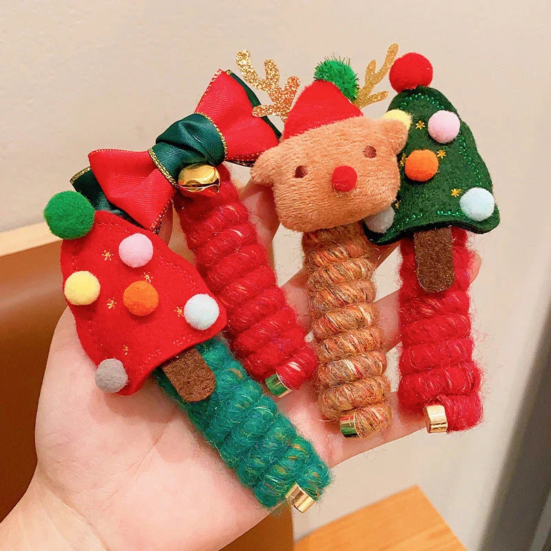 Festive Christmas Hair Ties with designs like jingle bells, Christmas trees, and reindeer - fun holiday accessories for girls