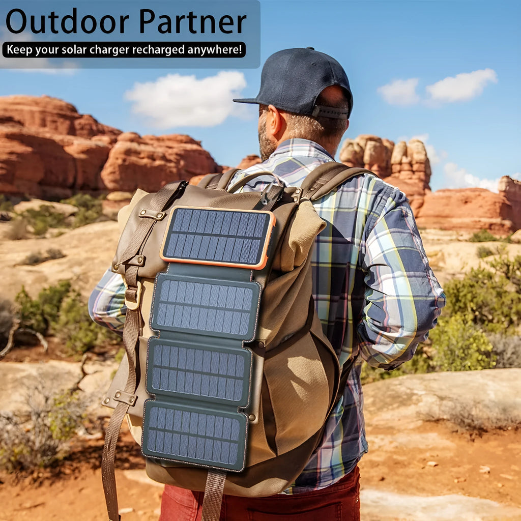 Outdoor solar power bank with waterproof black casing, solar panel, LED light, and USB ports