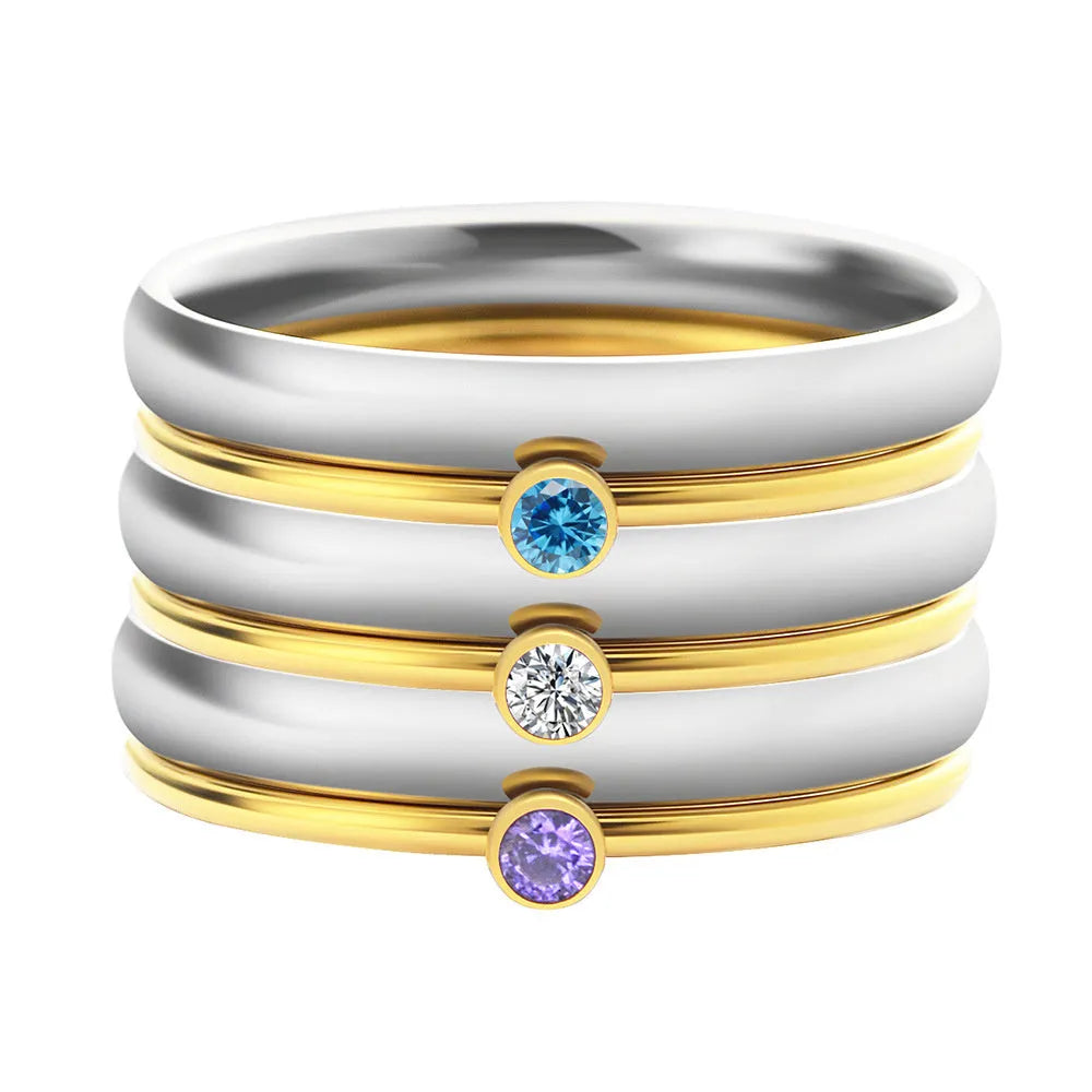December birthstone titanium steel ring with gold electroplate and engraved geometry design.