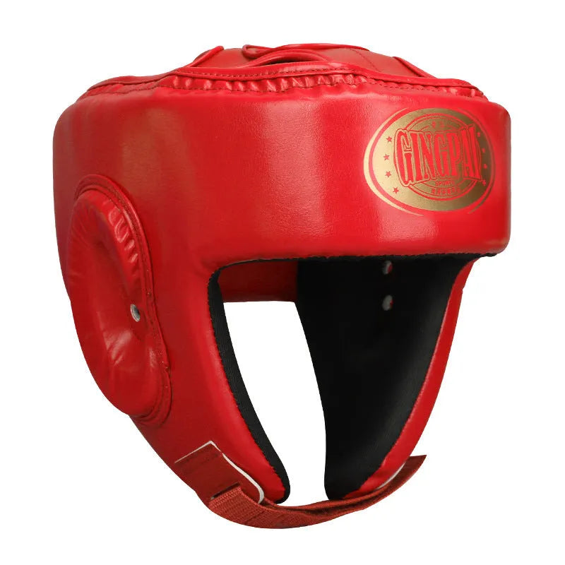 Red fully enclosed boxing helmet with integrated jaw protector for combat sports training