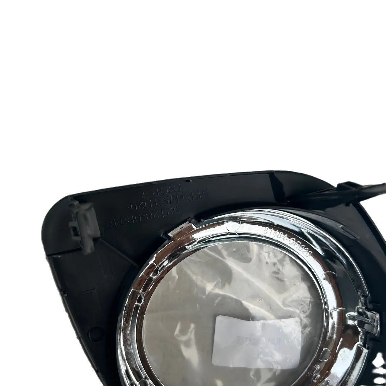 Black anti-fog lamp cover accessory for Toyota RAV4 front bumper, suitable for driver or passenger side.