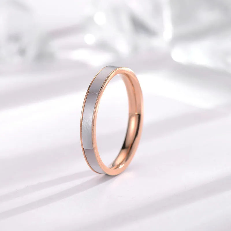 Titanium steel women's geometric ring with white shell inlay and electroplated finish