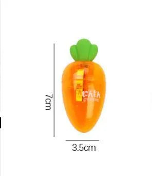Orange carrot-shaped plastic pencil sharpener with green top, 7cm total length