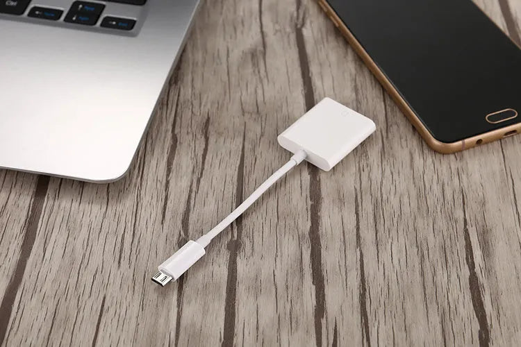 USB 2.0 SD card reader with 10 cm TPE+ABS cable in black colour on white background