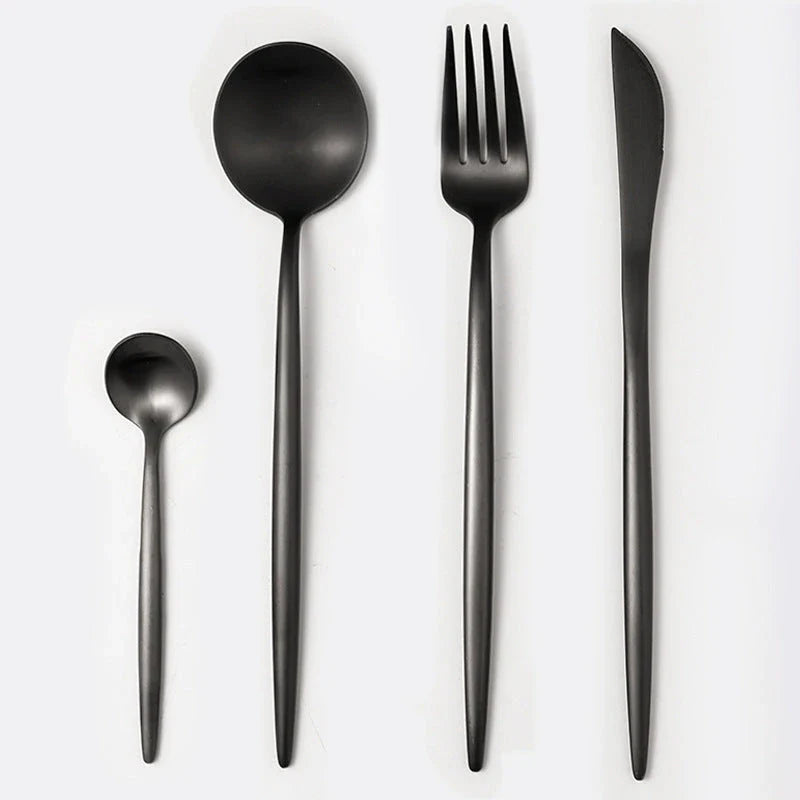 Premium stainless steel cutlery set with a mirror-polished finish, including coffee spoons, dessert spoons, main meal spoons, dessert forks, main forks, and chopsticks, presented in a stylish gift box.