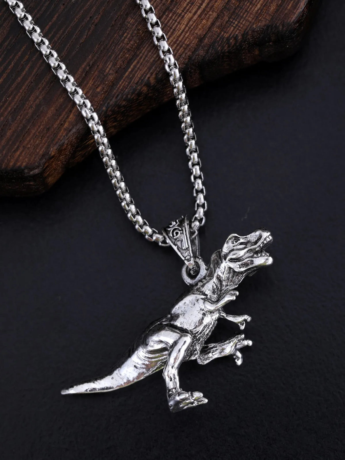 Titanium dinosaur pendant necklace in hip hop style, unisex versatile jewellery in dinosaur necklace colour