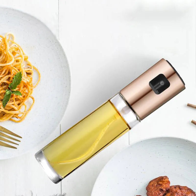 Gold push-type oil spray bottle with glass reservoir and ABS pump for BBQ and kitchen use