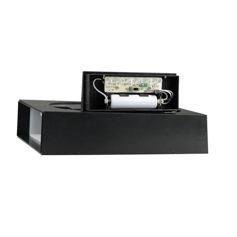 White solar-powered outdoor house number light with visible solar panel and LEDs.
