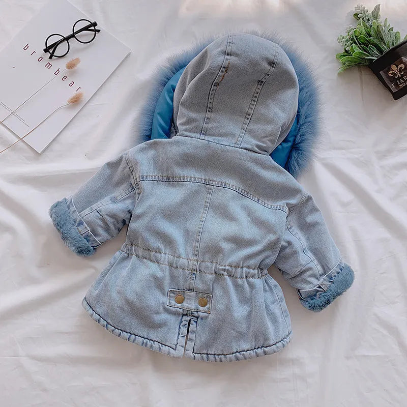 Blue denim coat for a girl with an attached hood and velvet lining.