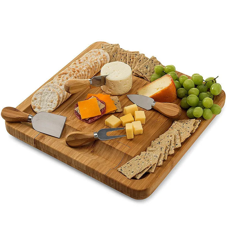 Square bamboo cutting board in wood colour with four knives and forks arranged on top